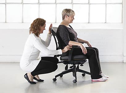 woman siting on workplace chair