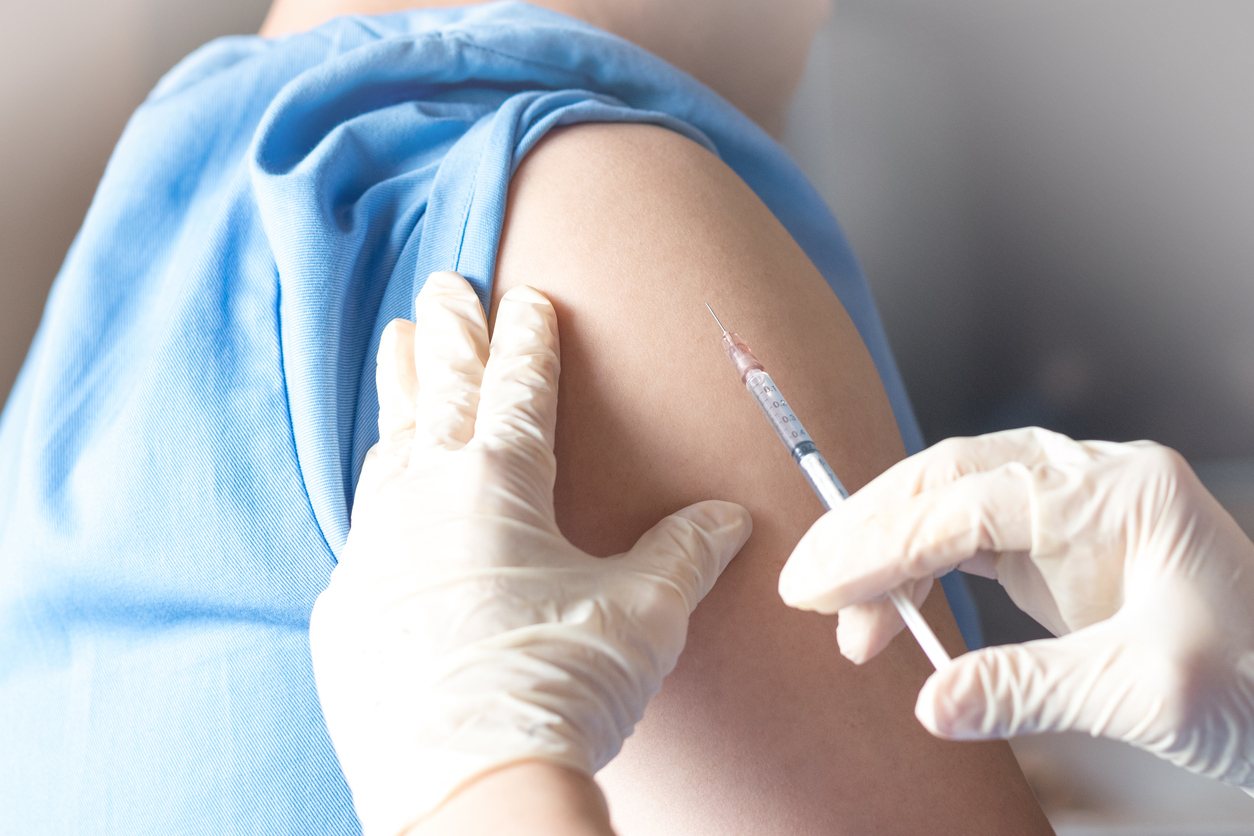 person receiving flu shot 