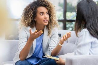 Health professional discussing mental health